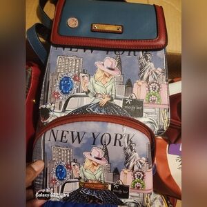 Mini backpack with a small cosmetic bag